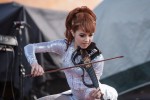 File Photo: Lindsey Stirling in concert in 2015, at the Bunbury Festival in Cincinnati, Ohio. Used by permission. (Photo Credit: Larry Philpot, soundstagephotography.com)