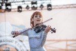 File Photo: Lindsey Stirling in concert in 2015, at the Bunbury Festival in Cincinnati, Ohio. Used by permission. (Photo Credit: Larry Philpot, soundstagephotography.com)