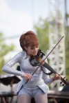 File Photo: Lindsey Stirling in concert in 2015, at the Bunbury Festival in Cincinnati, Ohio. Used by permission. (Photo Credit: Larry Philpot, soundstagephotography.com)