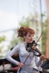 File Photo: Lindsey Stirling in concert in 2015, at the Bunbury Festival in Cincinnati, Ohio. Used by permission. (Photo Credit: Larry Philpot, soundstagephotography.com)