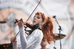 File Photo: Lindsey Stirling in concert in 2015, at the Bunbury Festival in Cincinnati, Ohio. Used by permission. (Photo Credit: Larry Philpot, soundstagephotography.com)