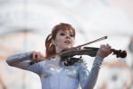 File Photo: Lindsey Stirling in concert in 2015, at the Bunbury Festival in Cincinnati, Ohio. Used by permission. (Photo Credit: Larry Philpot, soundstagephotography.com)